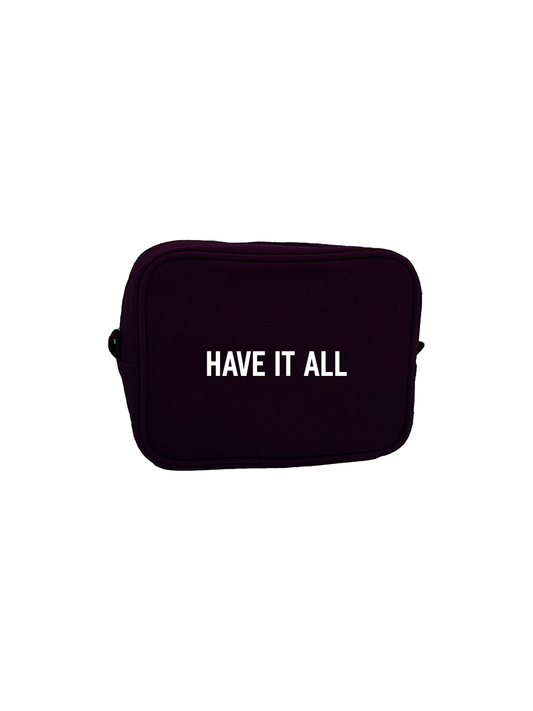 A black cosmetic makeup bag with the text 'HAVE IT ALL' printed in white.